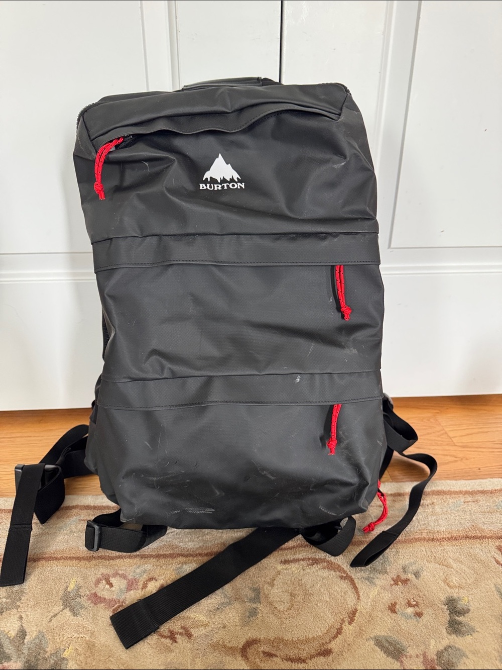 Burton Black Backpack with Red Pull Tabs
